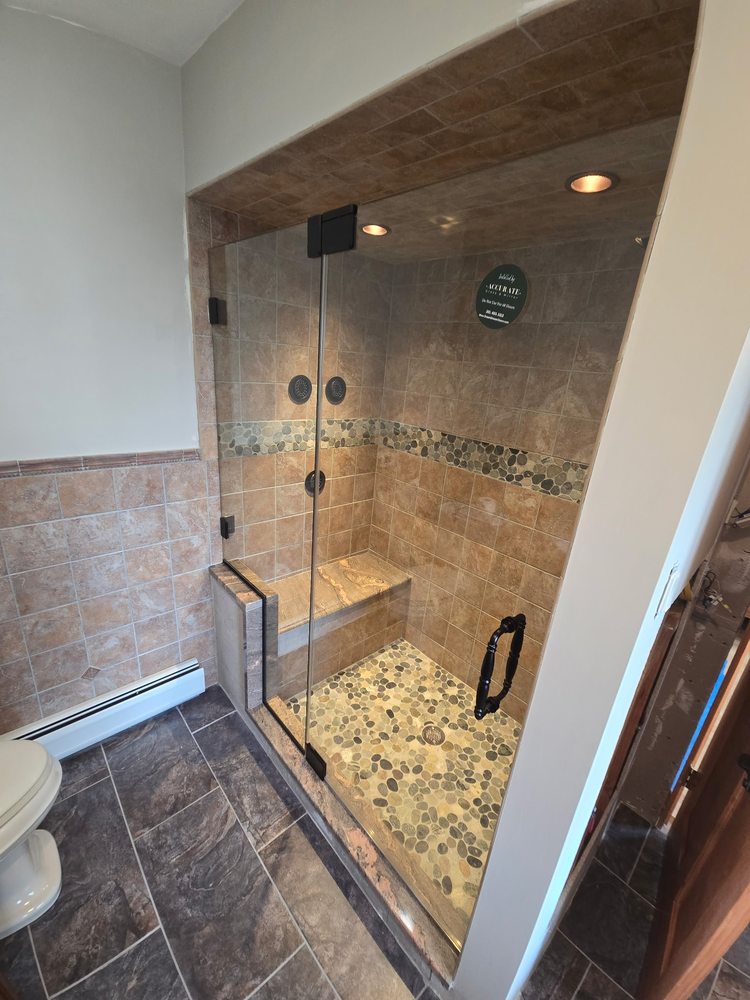 Glass shower enclosure