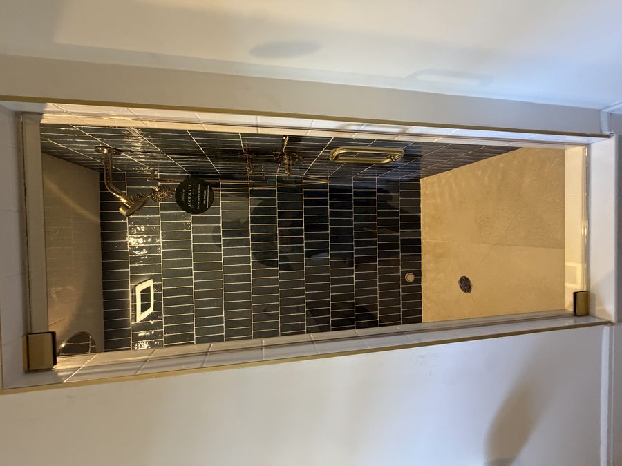 Large vanity mirror in a contemporary bathroom