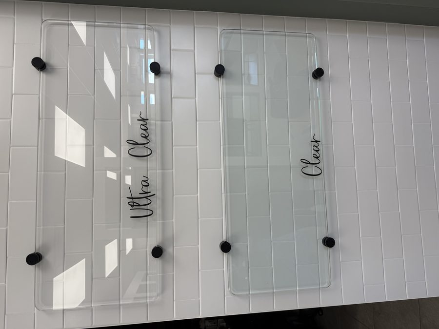 Back-painted glass kitchen backsplash with seamless color